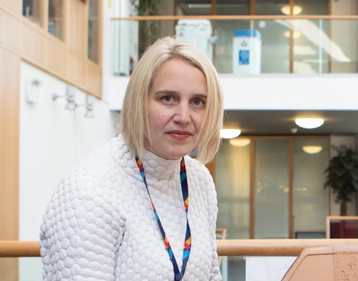 Rebecca Champion, wearing a textured white top and lanyard, poses beside a clay model of a car at Glasgow Kelvin College. Rebecca Champion, wearing a textured white top and lanyard, poses beside a clay model of a car at Glasgow Kelvin College.